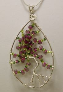 Make this cherry blossom pendant in our Tree of Life class.