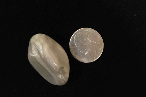 Comparing size of Flint stone to a nickel