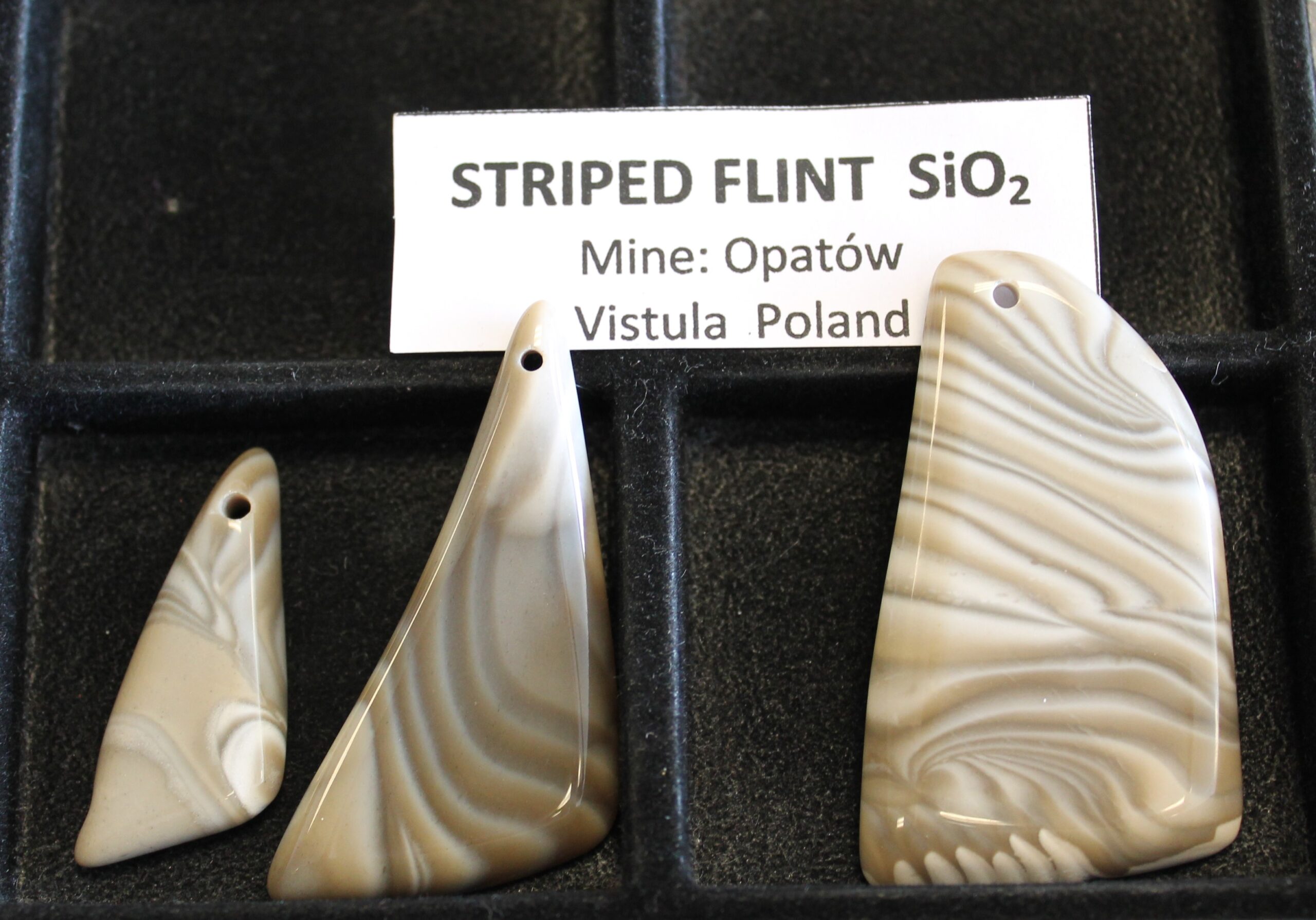striped flint pendant pieces
